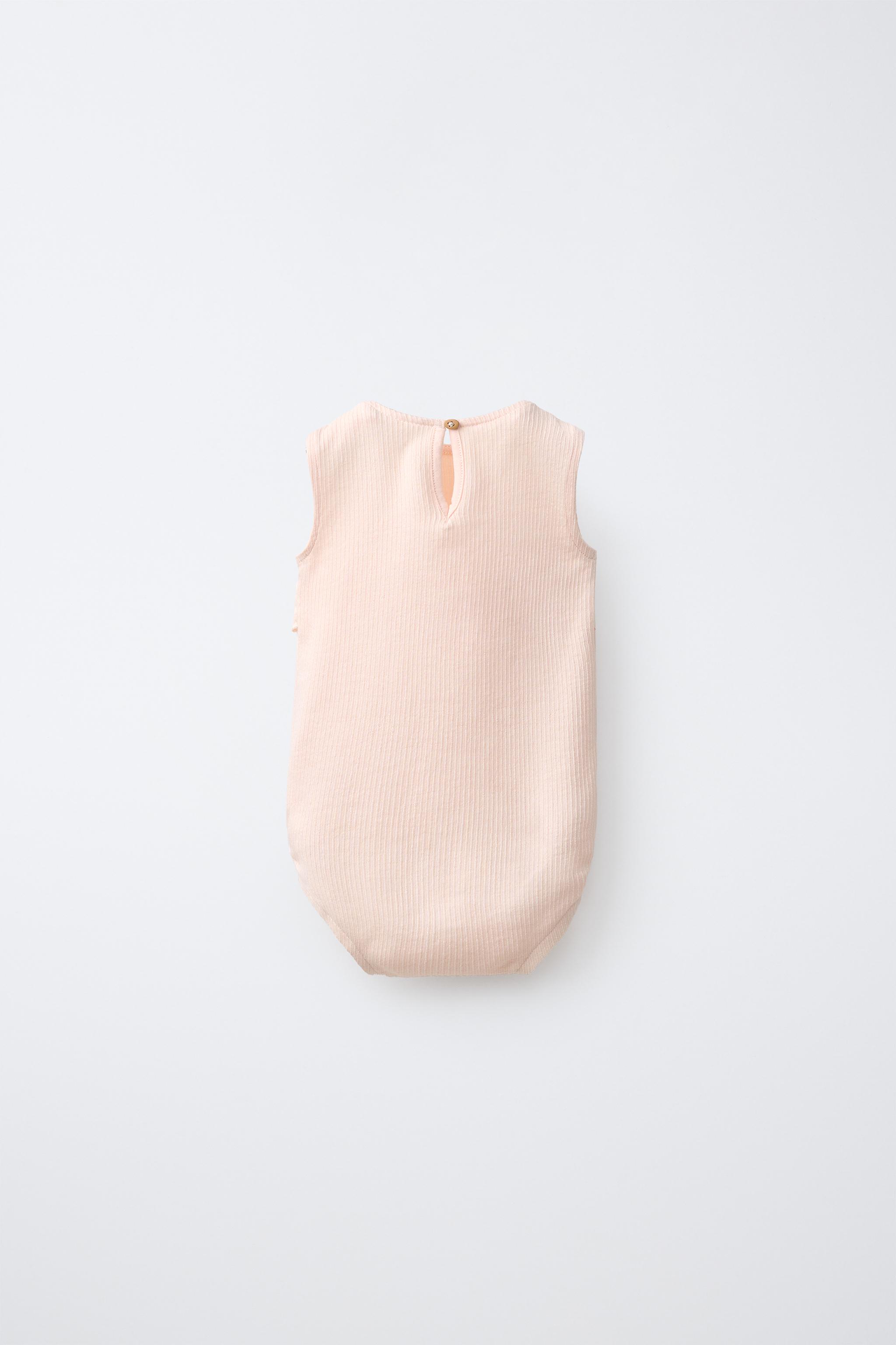 SUN EMBROIDERED RUFFLED BODYSUIT